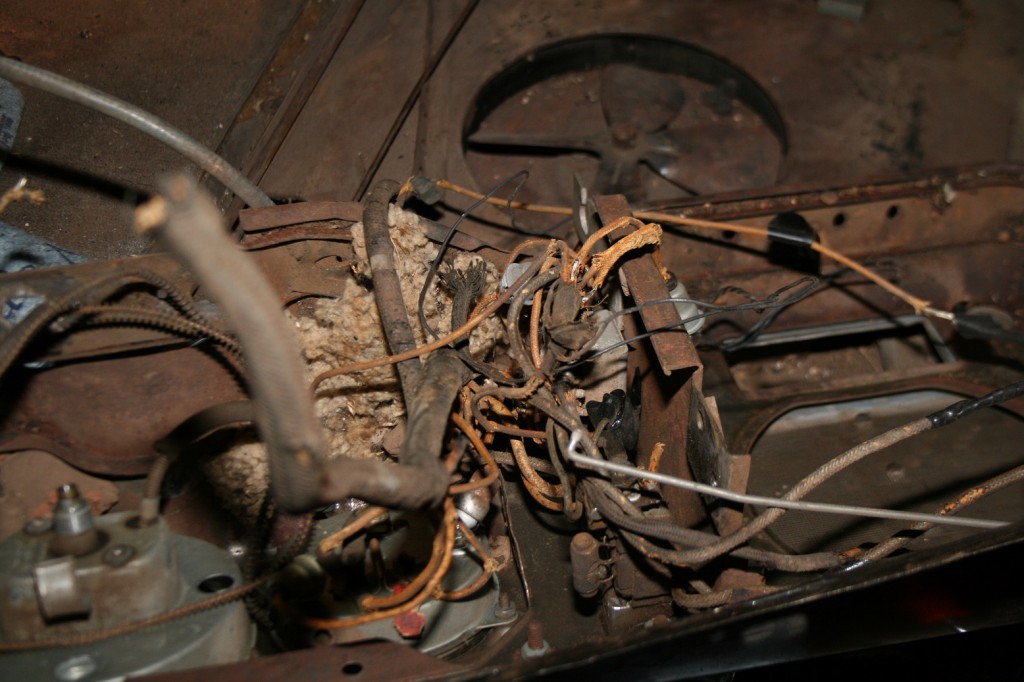 5. For photography purposes, we removed the entire dash (it needed painted anyways) and found a wonderfully preserved rat nest. The wires under the dash were simply clipped off. The kit comes with a diagram for each switch.