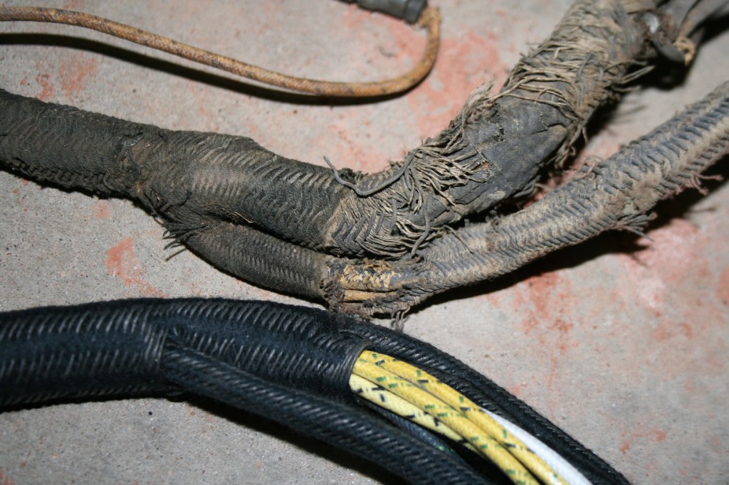12. Here is a close up of the 2 harnesses. The new harness is identical in the use of material and wiring codes.