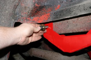 16.The special bolts are designed to push through the frame and the shoulder hits the inner frame rail. This keeps the link stationary and does not allow the bracket to slide side to side.