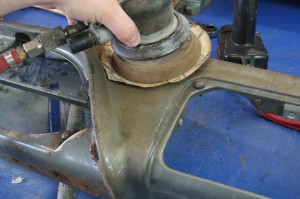 16.The dash was sanded down to bare metal. There was a significant amount of pitting on the forward edge of the dash, where it meets the windshield.