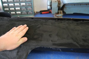 19.Then we applied a little scrap of ultra-suede fabric. This might seem like overkill, but replacement black-out paper costs a lot more than scrap from a previous project. Any heavy black fabric will work, we considered vinyl, but the ultra suede is much thinner and interfered less. You could source some scrap from your local upholstery shop at no charge, in most cases.