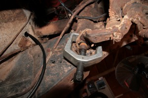 02.First, we pulled the steering components. The pitman arm is difficult to remove, even with a puller. You can rent these from your local parts store if you don’t own one, but this one puller works great for tie-rod ends and ball joints too.