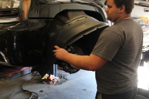 To get started Kyle Miller of AntiVenom removed the plastic tabs and the fender liners via the pushpins and 10mm bolt.