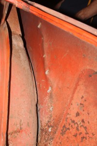 02.One look in the trunk, however, shows a different story. There is a long crease that has been filled with bondo, complete with bondo worms. This had to go.