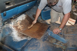 04.We yanked the seat and seat belts and started on the floor. There was some surface rust, nothing major, but it needs treated before moving in. We hit it with a wire brush, and then vacuumed it all.