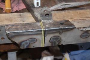 19.The lower cradle is designed to match up to the MKIV chassis, but the Comet does not need the extra material. We marked the excess material on the front lower portion of the cradle.