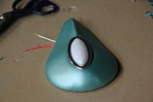 20. We made a custom sculpted dome light pod using wood and body filler and wrapped in vinyl. The pearlescent green vinyl looks great, though we may end up changing it later on to better match the seats. It does break up the large expanse of black on the headliner though. The Autoloc dome light adds a nice touch of flash.