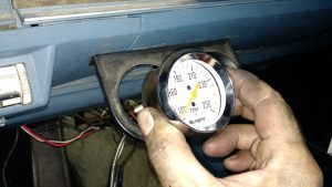 Start by feeding the sensor and capillary tube through the gauge mount. If you are using the supplied mount, then it has already been done. We are using a dual mount and simply replacing the old gauge.