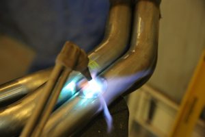 Using a torch, the pipe was heated up to cherry red. Be careful not to melt the metal.