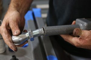 21. We assembled the upper control arms using anti-seize on the threads (do this to all adjustable components).